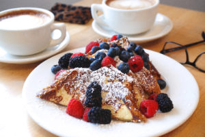 Brioche French Toast with Berries, Powdered Sugar & Maple Syrup