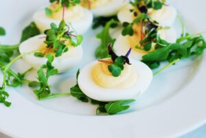 Hummus Deviled Eggs with Microgreens