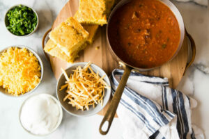 Beef Chili with Jalapeno Cheddar Cornbread and Topping