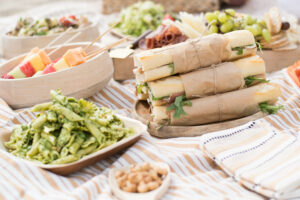 Seasonal Fruit Skewers, Pesto Pasta with Peas and Pine Nuts, Picnic Sandwiches